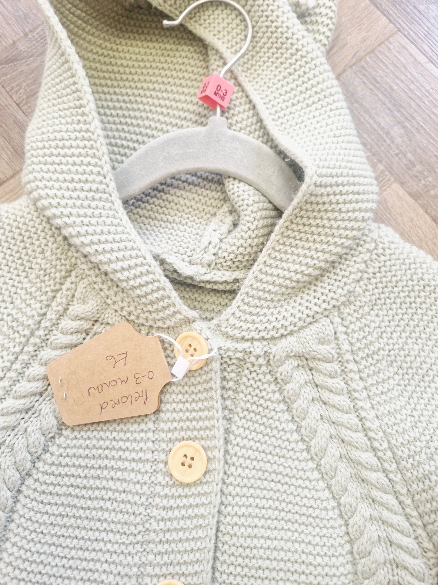 Sage green knit baby pramsuit Preloved