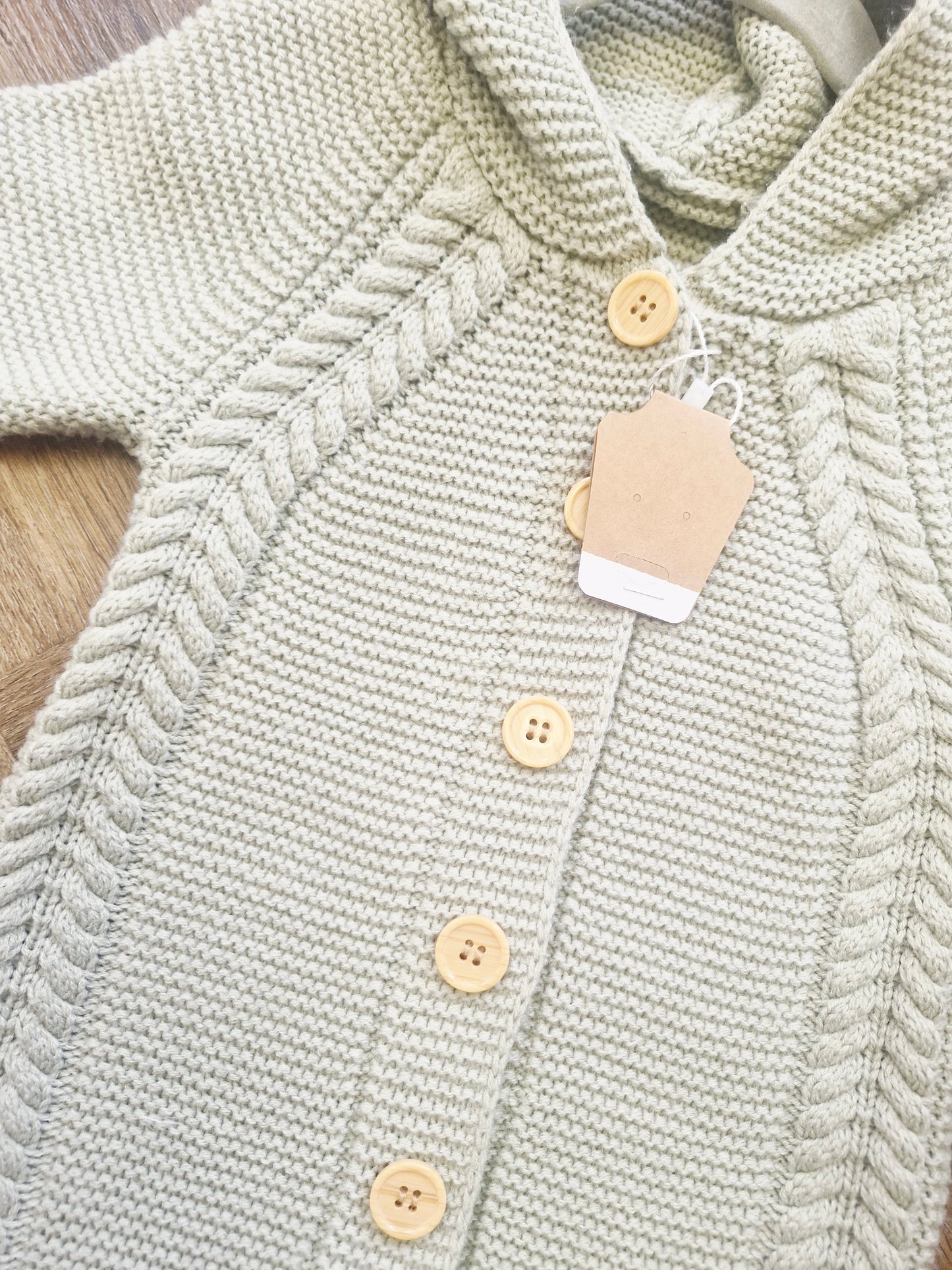 Sage green knit baby pramsuit Preloved