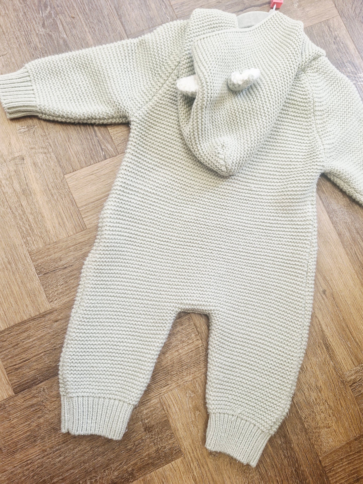 Sage green knit baby pramsuit Preloved