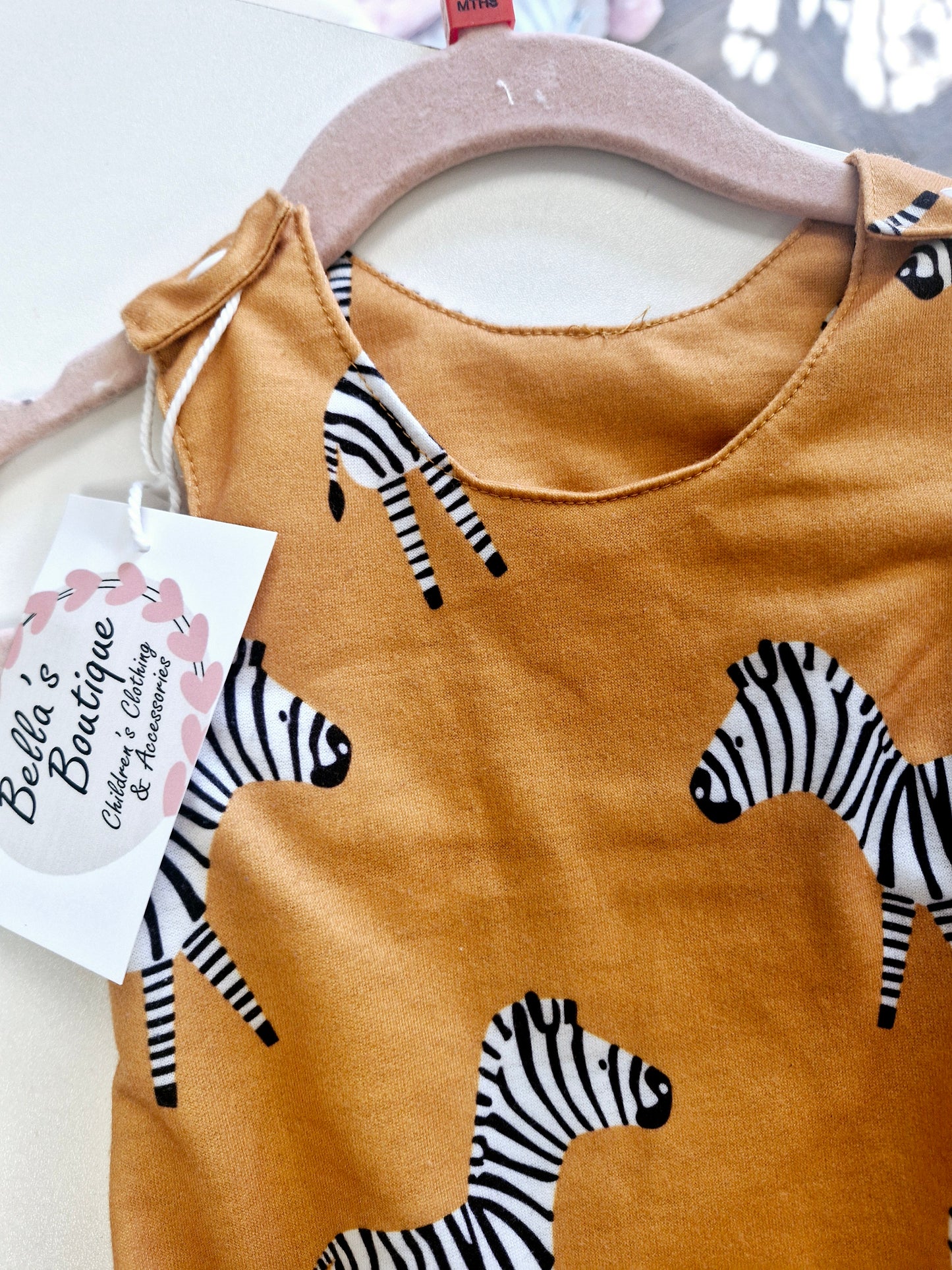 Zebra print romper preloved 0-6 months