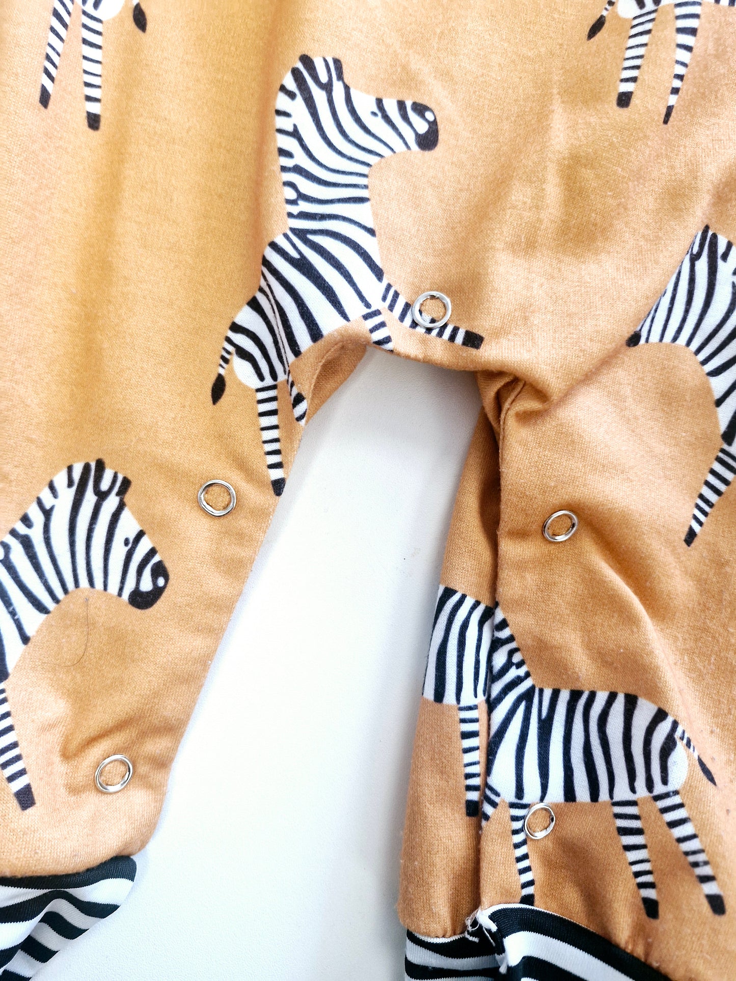 Zebra print romper preloved 0-6 months