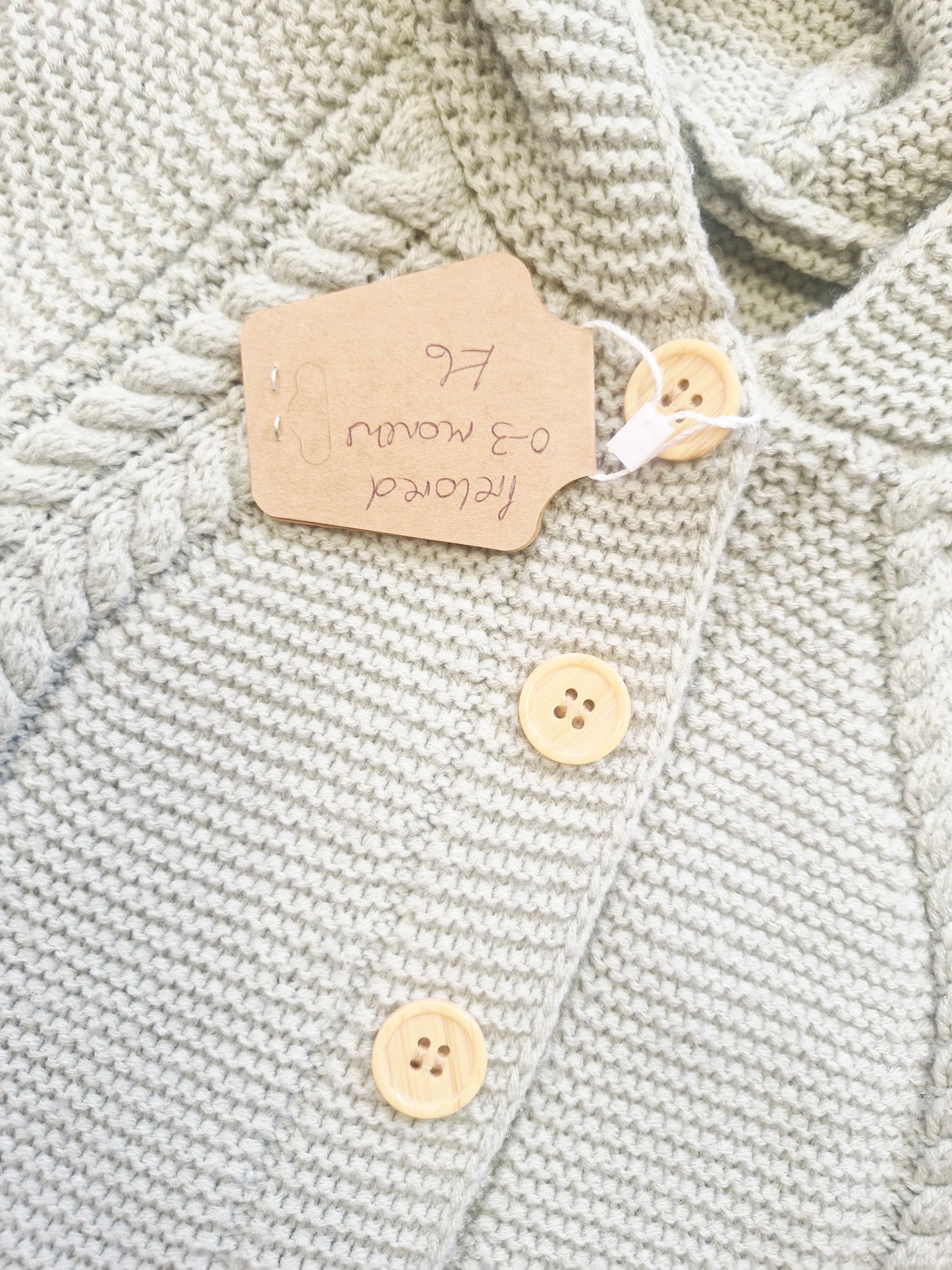 Sage green knit baby pramsuit Preloved